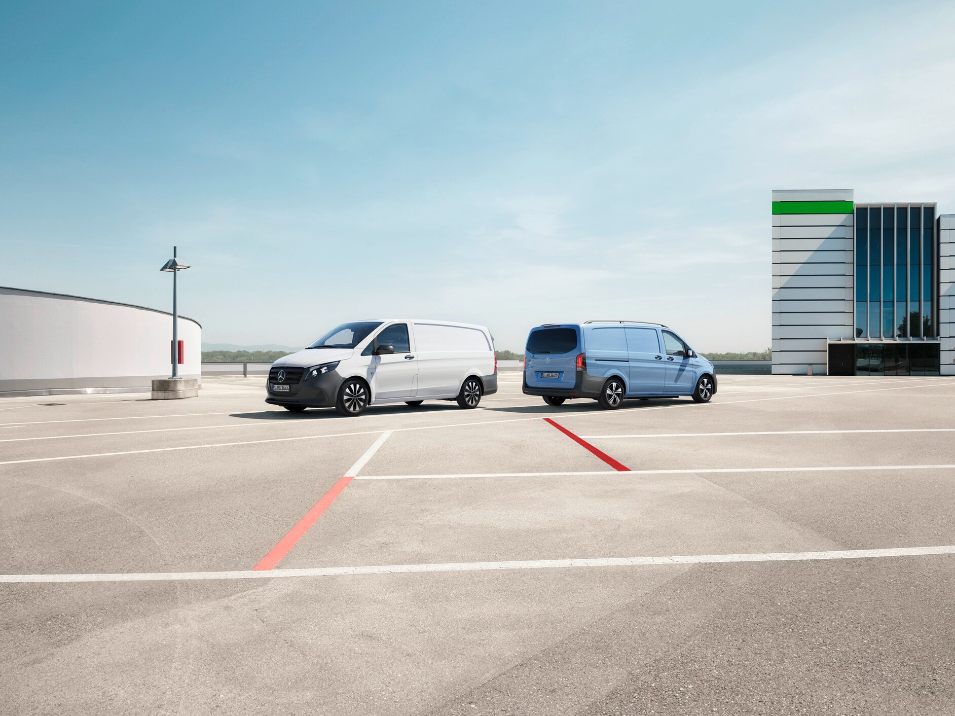 The Vito Panel Van and eVito Panel Van standing in a parking lot.