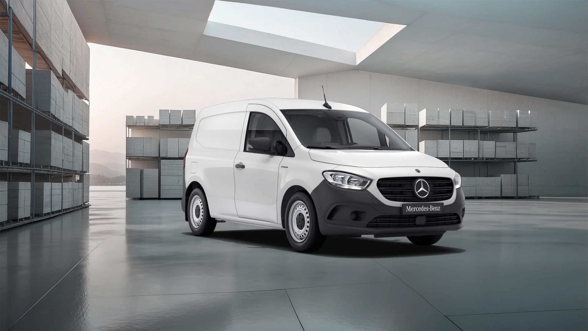 eCitan Panel Van | Mercedes-Benz Vans White Mercedes-Benz eCitan Panel Van parked by modern concrete structure.